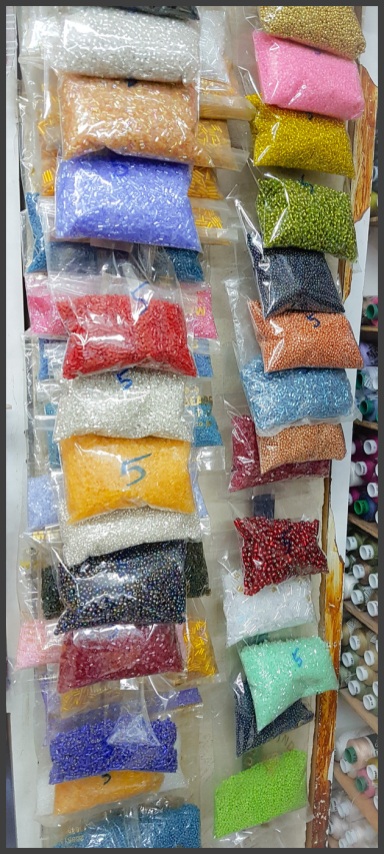 Beads in packets
